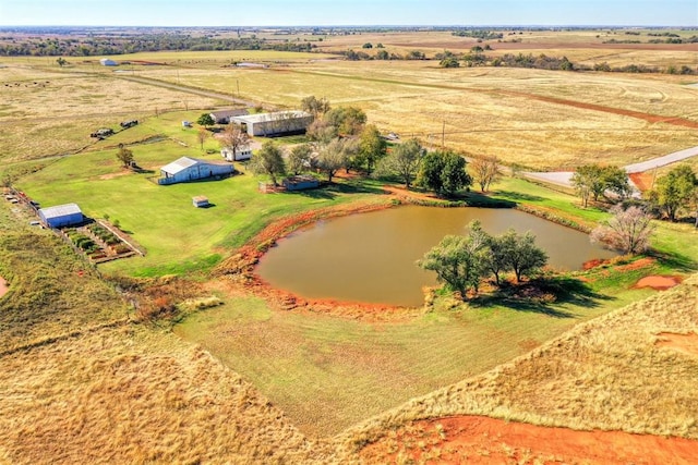 aerial view with a rural view and a water view