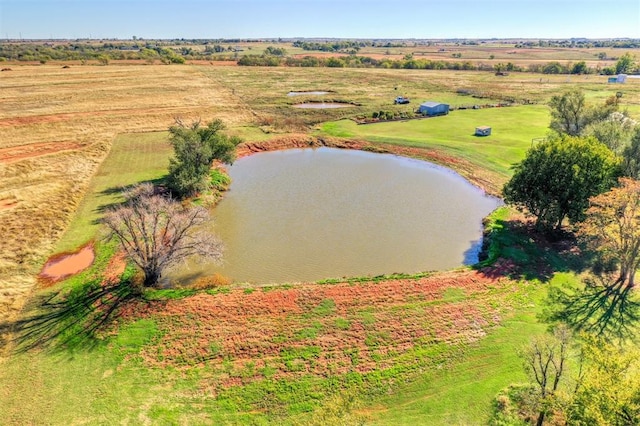 drone / aerial view featuring a rural view and a water view