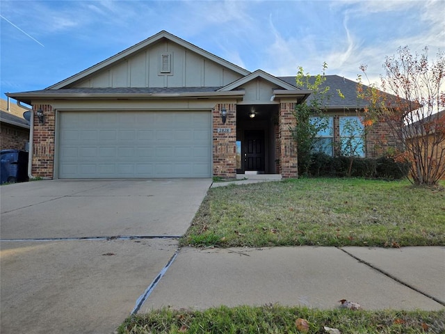 single story home featuring a garage and a front lawn