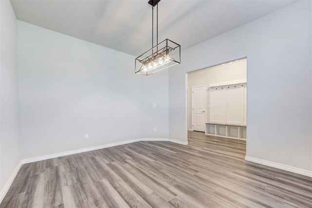 unfurnished dining area with light hardwood / wood-style floors