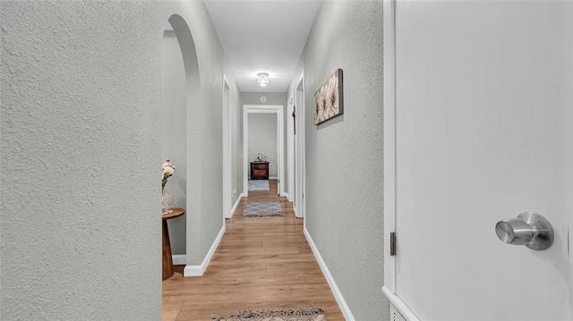 hallway featuring light hardwood / wood-style flooring