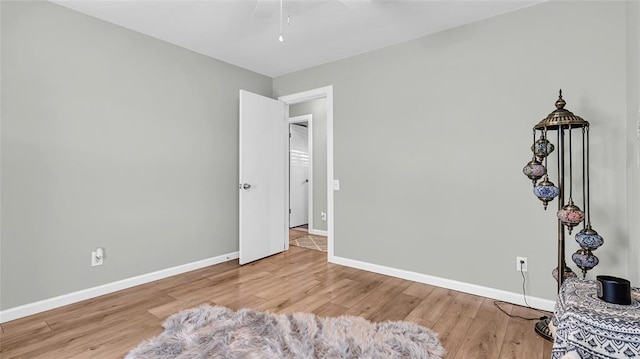 bedroom with ceiling fan and light wood-type flooring