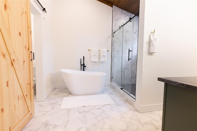 full bathroom featuring vanity, shower with separate bathtub, and toilet