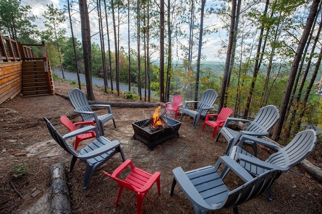 view of patio with an outdoor fire pit