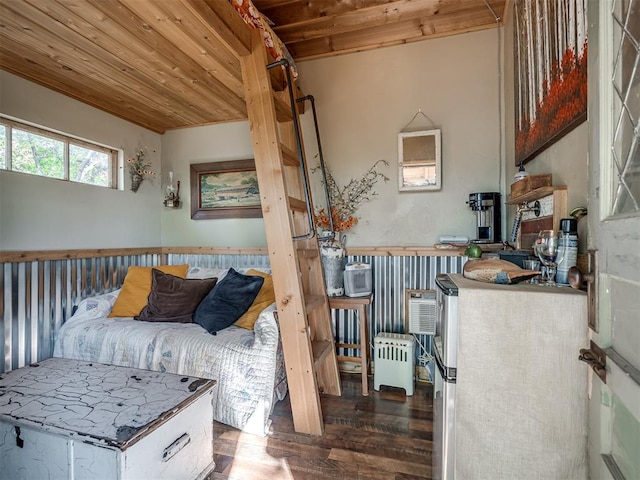 living area featuring dark hardwood / wood-style flooring and wood ceiling