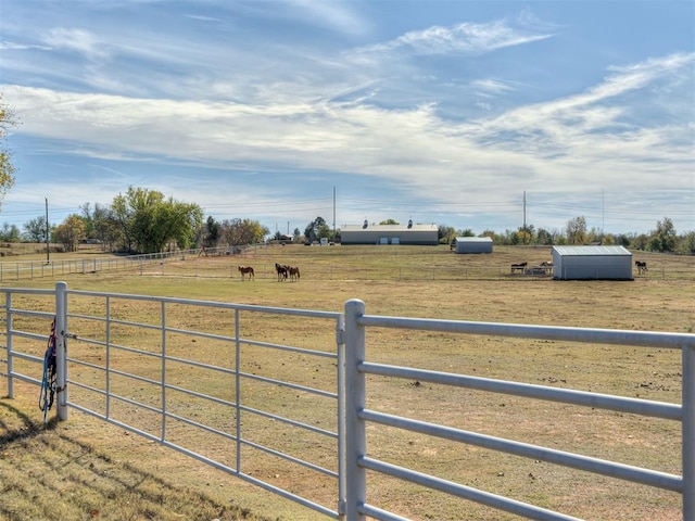 view of gate featuring a rural view