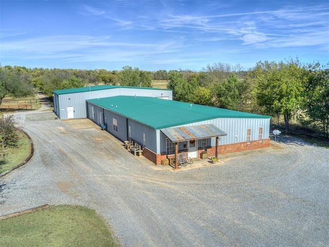 view of front of house featuring an outbuilding