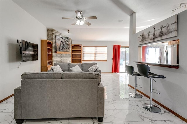 living room with ceiling fan