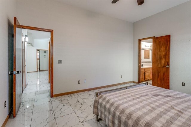 bedroom with ceiling fan and connected bathroom