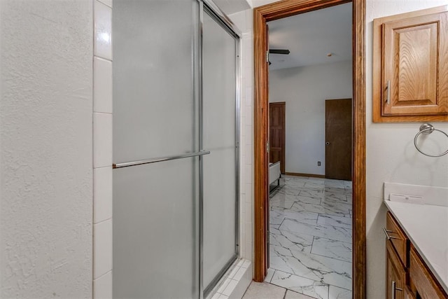 bathroom with vanity and an enclosed shower