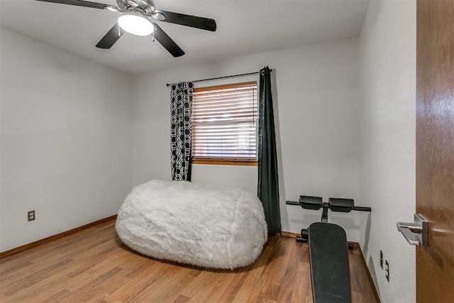 sitting room featuring ceiling fan and hardwood / wood-style flooring