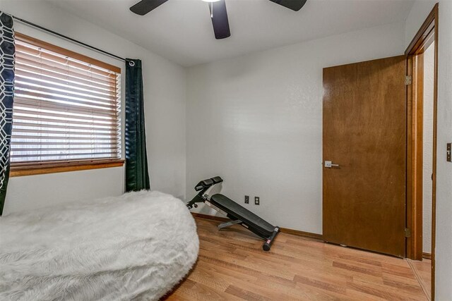 bedroom featuring ceiling fan and light hardwood / wood-style flooring