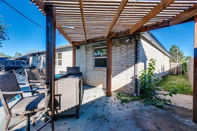 view of patio / terrace featuring a pergola