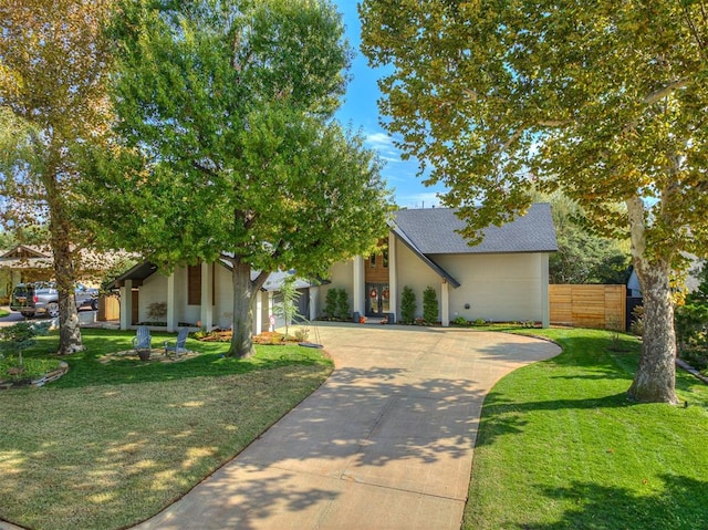 view of front of property with a front lawn