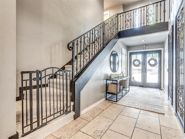 entryway featuring french doors