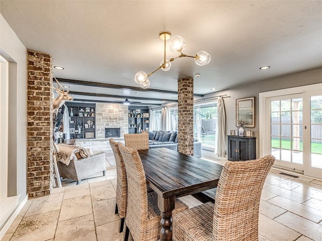 dining room featuring plenty of natural light