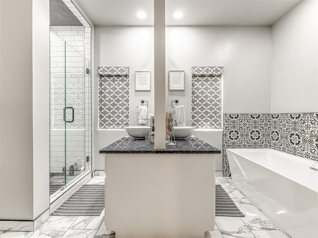 bathroom with separate shower and tub and vanity