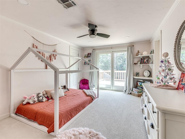 carpeted bedroom featuring access to outside, ceiling fan, and ornamental molding