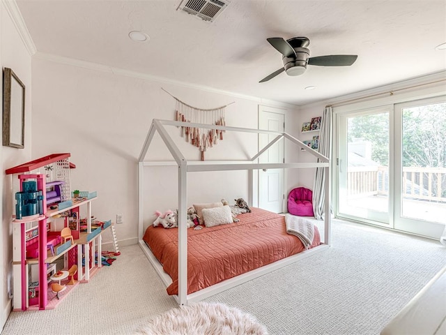 carpeted bedroom featuring access to exterior, ceiling fan, and ornamental molding