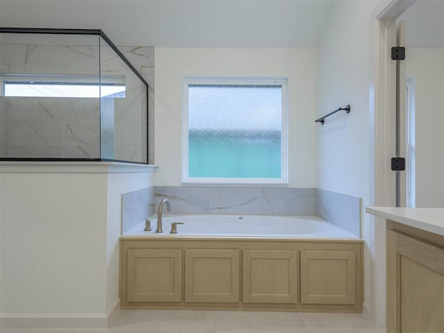 bathroom with separate shower and tub, tile patterned flooring, and vanity