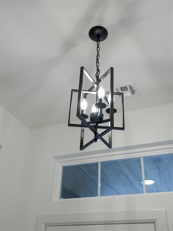 12129 SW 45th Ter, Mustang, OK 73064 - detailed view of a chandelier