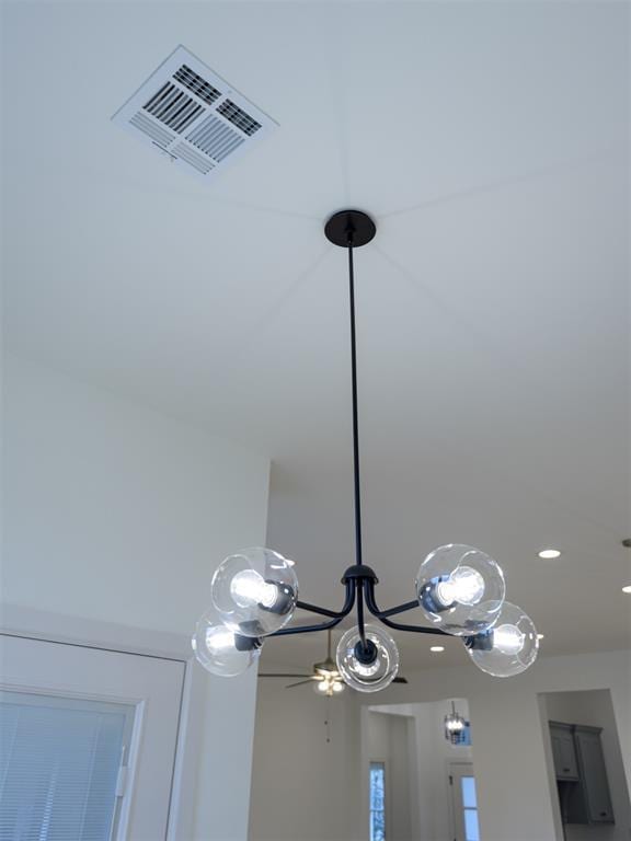 12129 SW 45th Ter, Mustang, OK 73064 - detailed view of a ceiling fan and recessed lighting