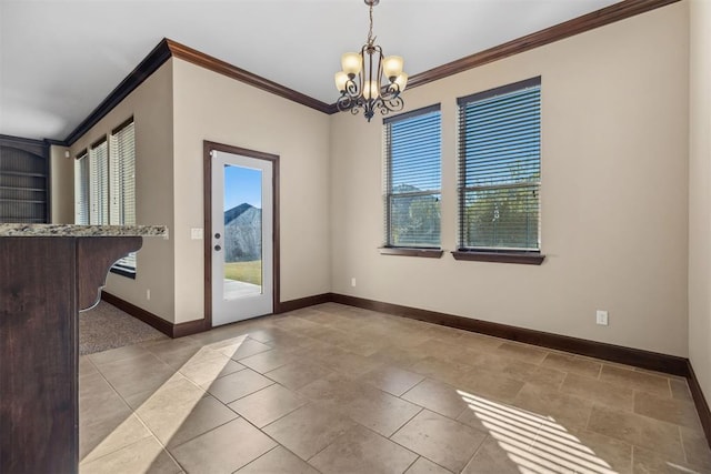 unfurnished dining area featuring a chandelier and ornamental molding