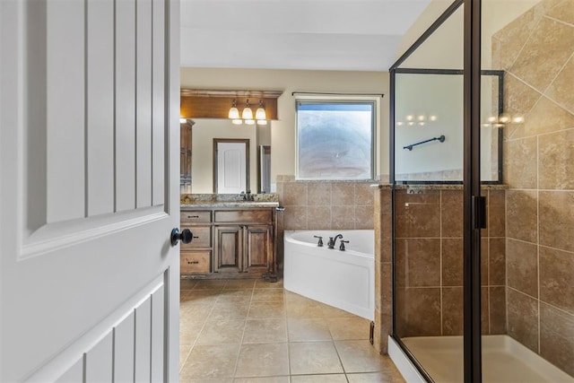 bathroom with vanity, separate shower and tub, and tile patterned floors