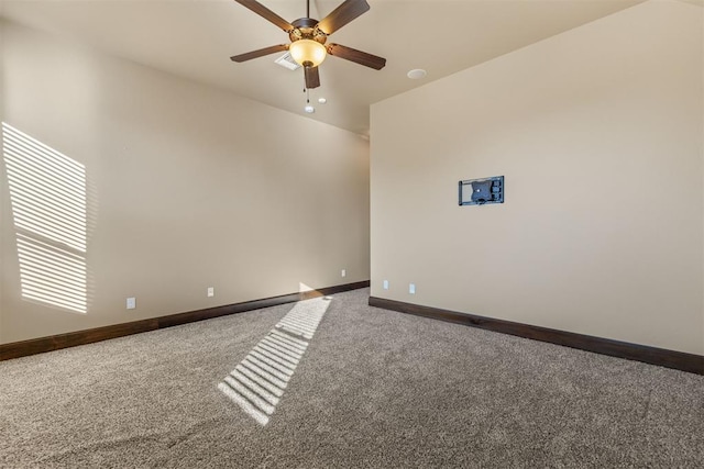 unfurnished room with carpet and ceiling fan