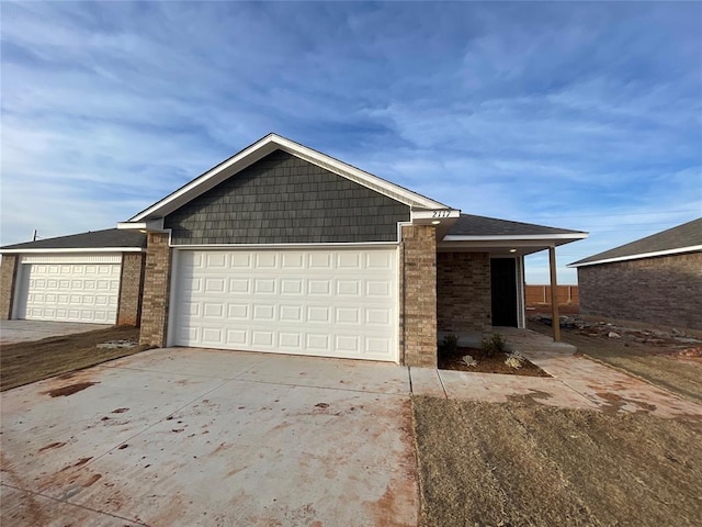 view of front of property with a garage