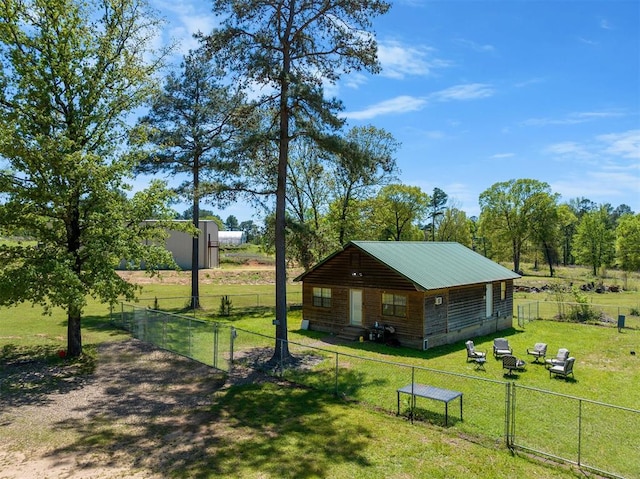 view of yard with a rural view