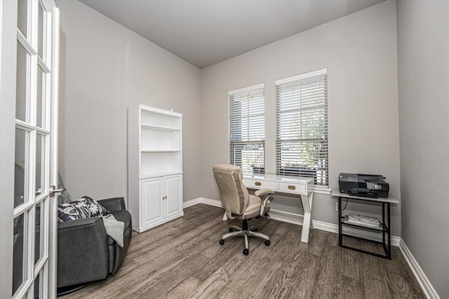 office area with hardwood / wood-style flooring