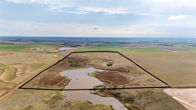 birds eye view of property featuring a rural view