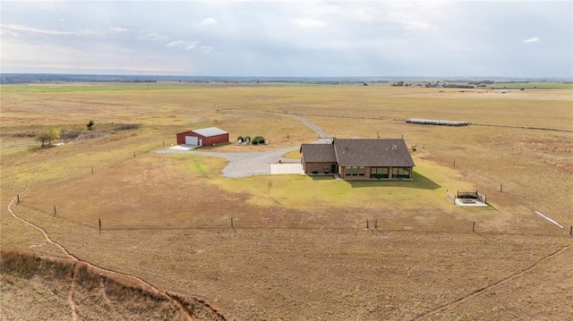 birds eye view of property featuring a rural view