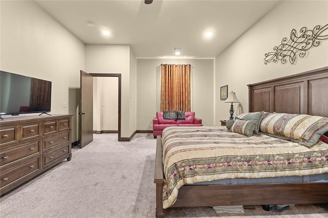 bedroom featuring light colored carpet