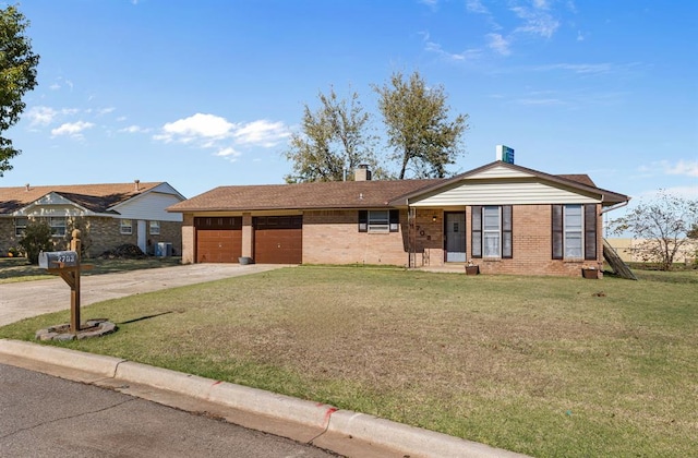 ranch-style home with central AC unit, a garage, and a front lawn