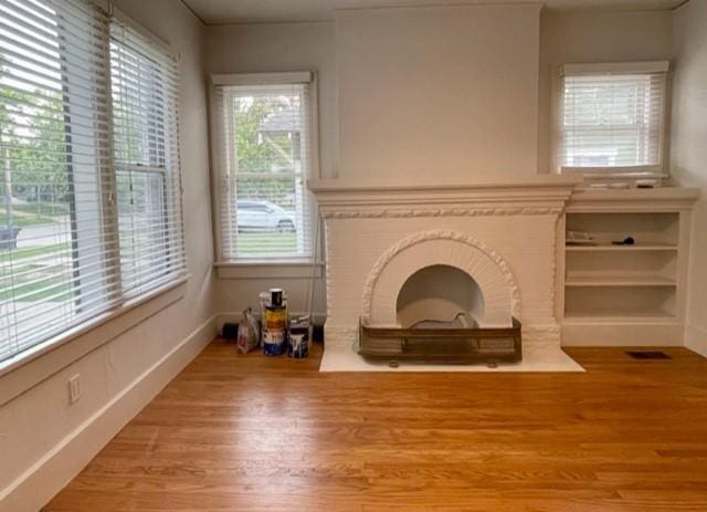 living area with wood-type flooring