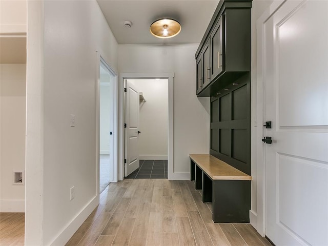 mudroom featuring wood-type flooring