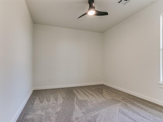 carpeted empty room with ceiling fan