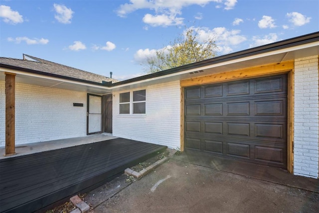 garage with driveway