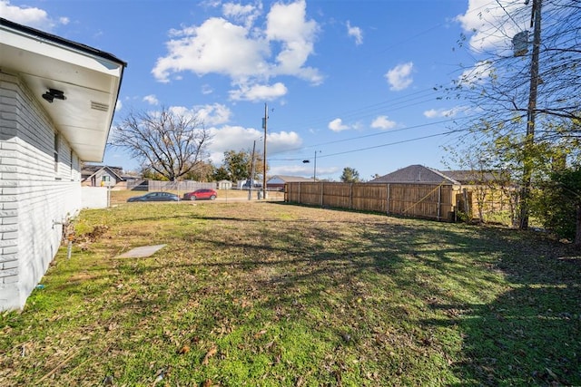 view of yard with fence