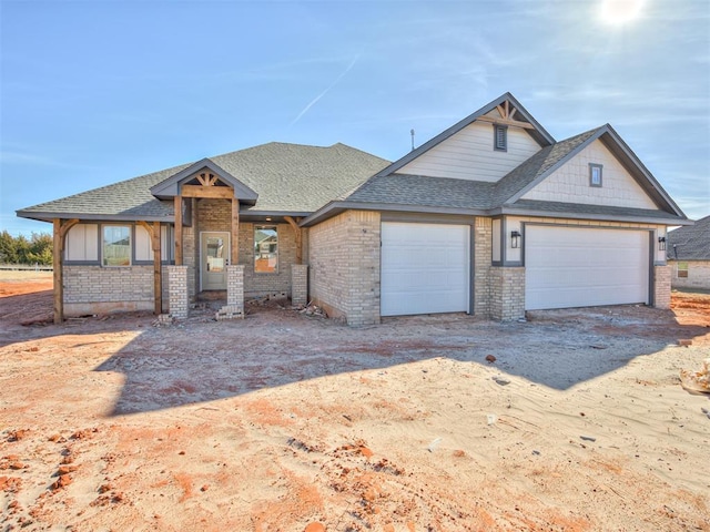 craftsman-style home featuring a garage