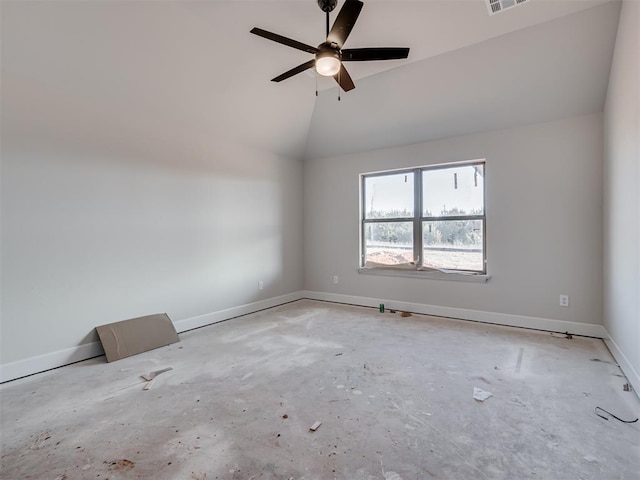 spare room featuring vaulted ceiling and ceiling fan