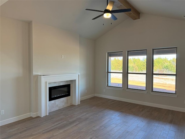 2800 Juneberry Ln, Newcastle, OK 73065 - unfurnished living room featuring a glass covered fireplace, ceiling fan, and wood finished floors