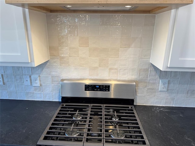 2800 Juneberry Ln, Newcastle, OK 73065 - room details featuring backsplash, white cabinets, dark countertops, and stainless steel gas stove