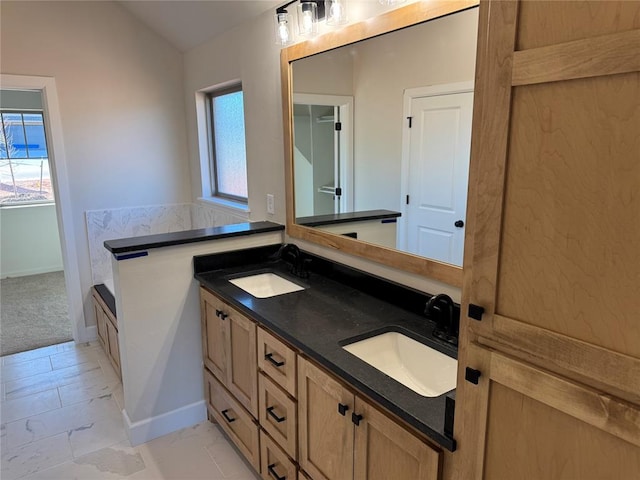 2800 Juneberry Ln, Newcastle, OK 73065 - bathroom with marble finish floor, double vanity, lofted ceiling, and a sink