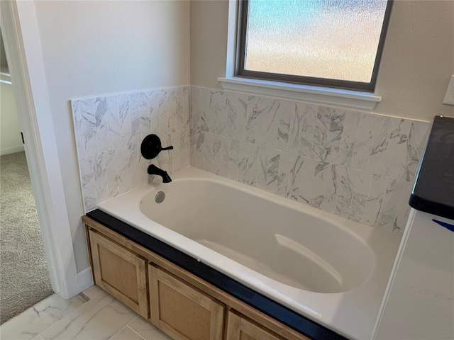 2800 Juneberry Ln, Newcastle, OK 73065 - bathroom with marble finish floor and a bath