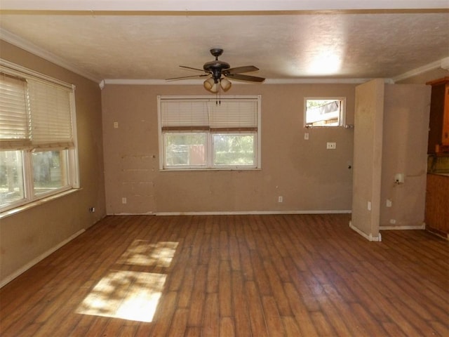 unfurnished room featuring hardwood / wood-style floors, ceiling fan, and ornamental molding