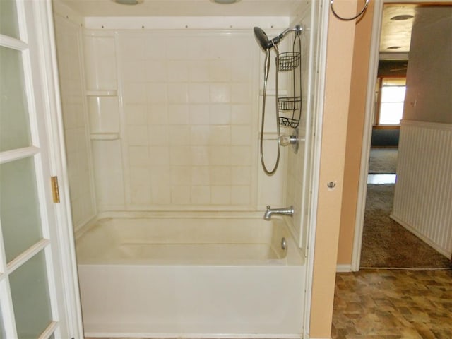 bathroom with washtub / shower combination