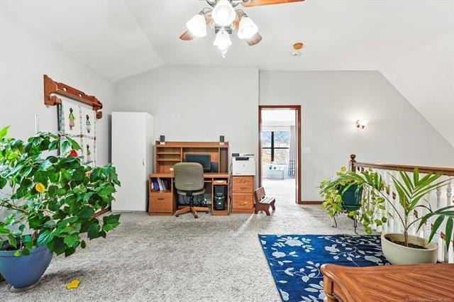 carpeted office featuring ceiling fan and lofted ceiling